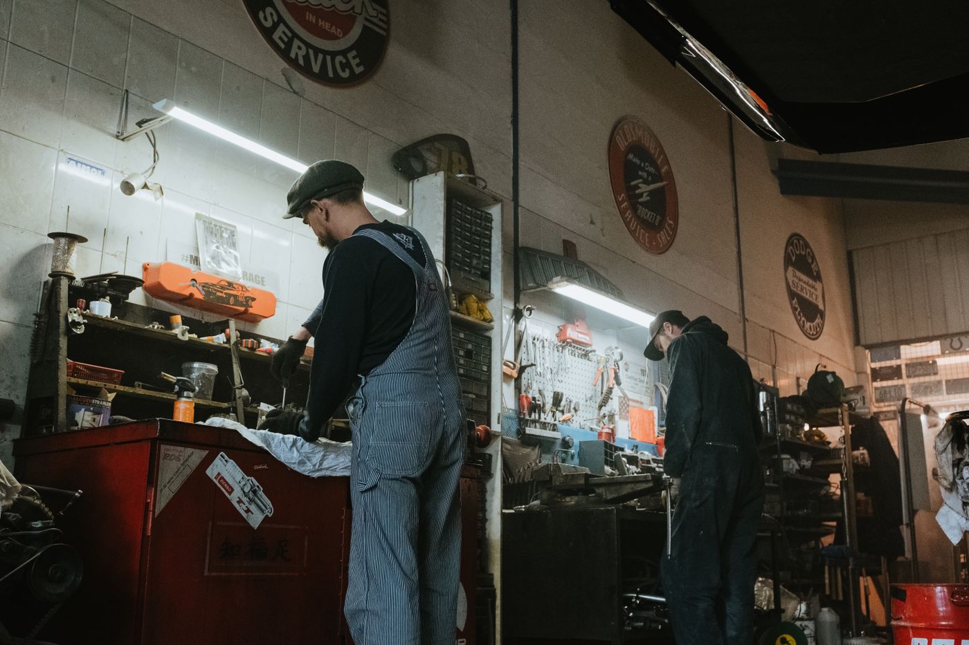 Clean, organized auto repair workshop with lifts
