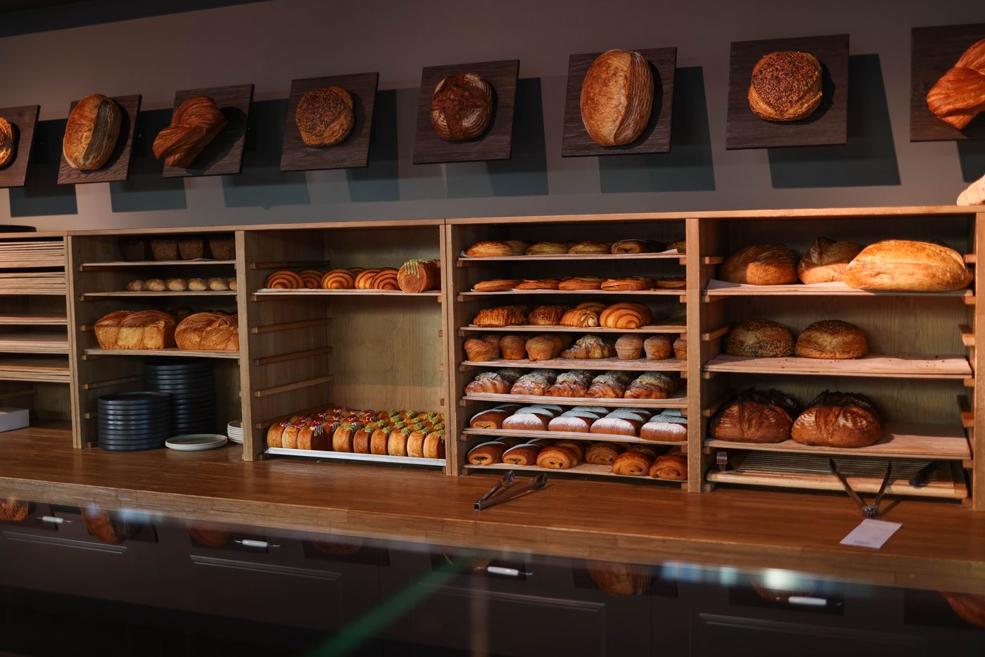 Warm bakery interior with display shelves