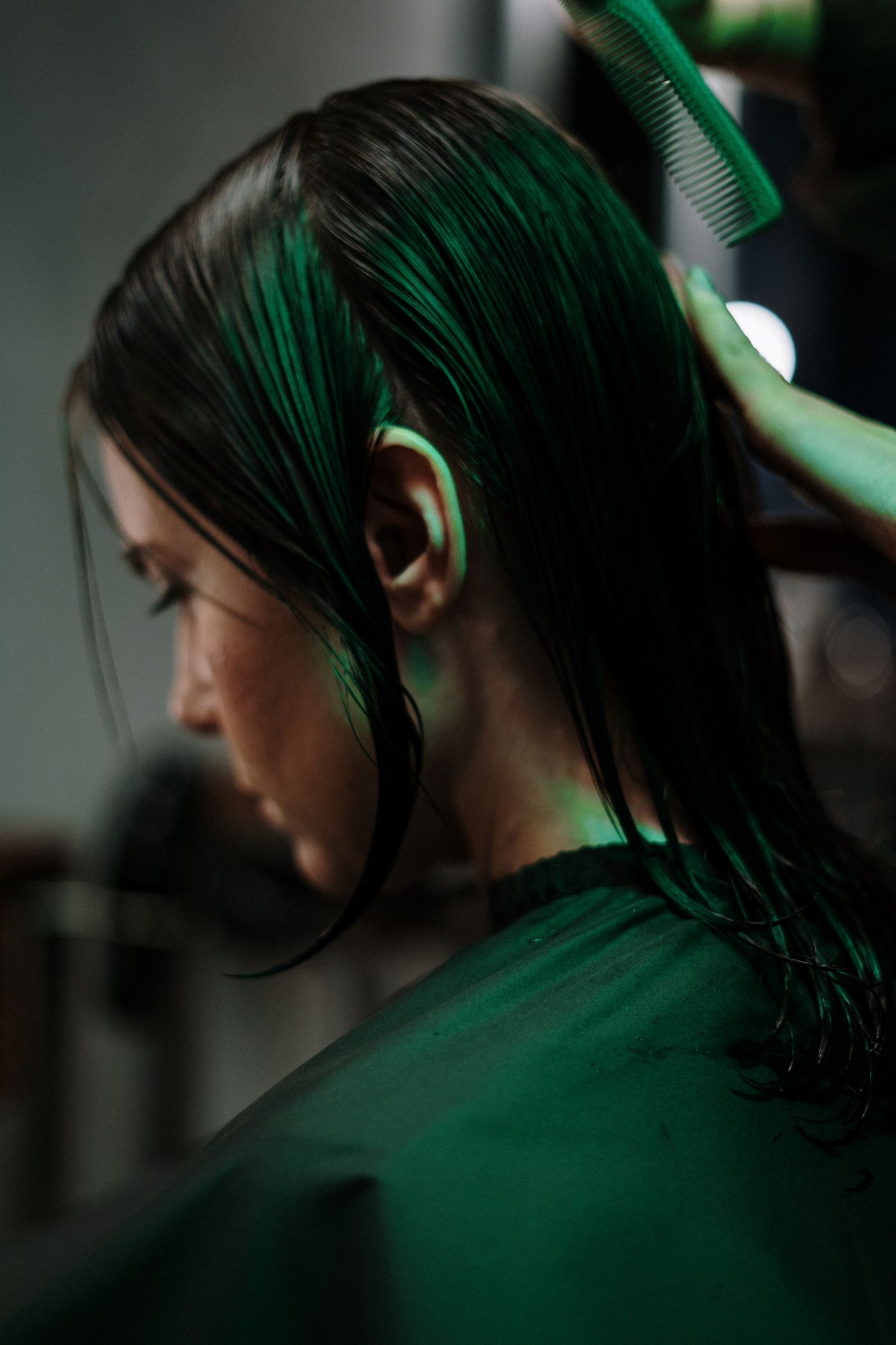 Barber cutting a client's hair
