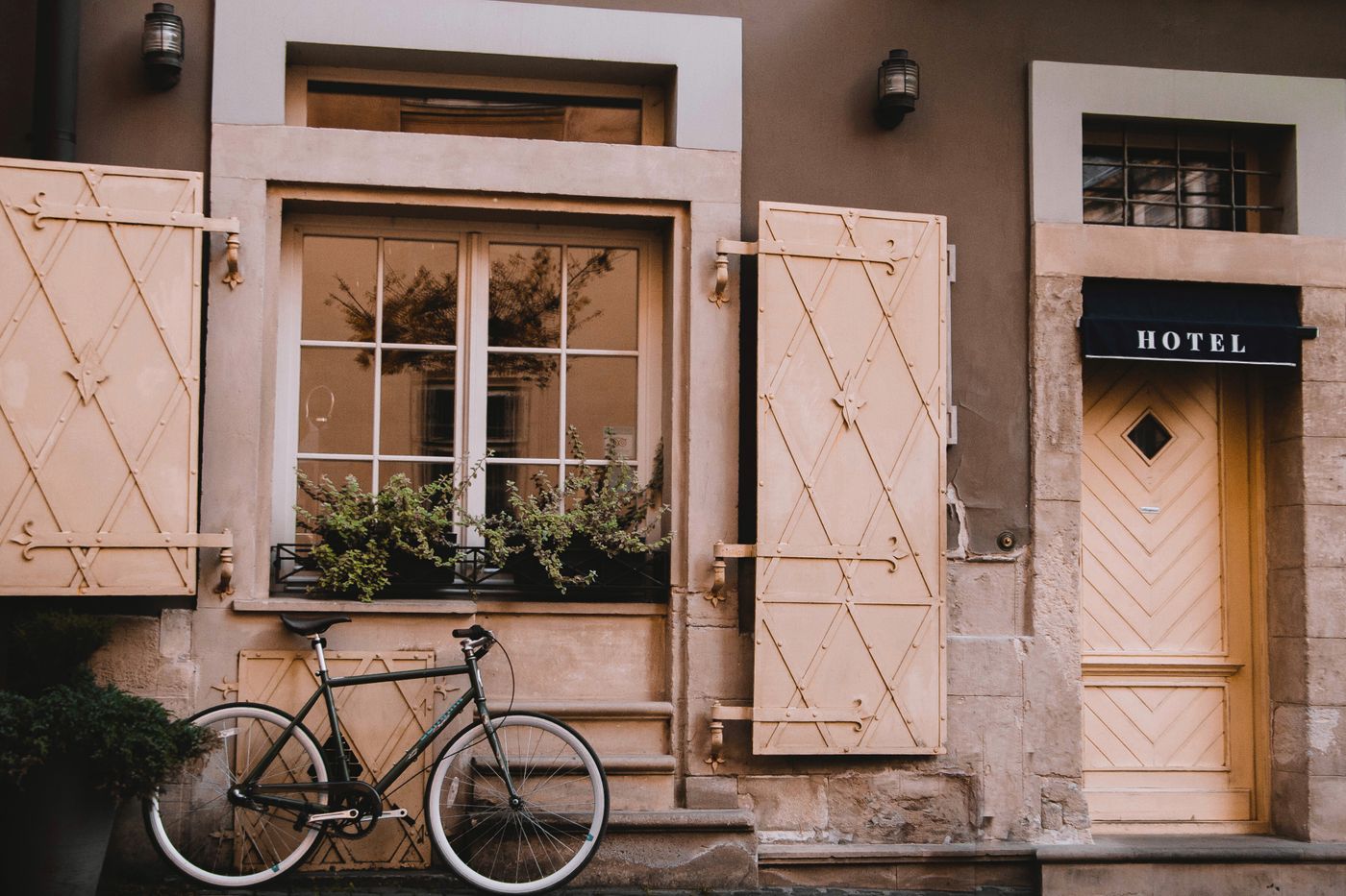 Ivy-covered boutique inn at golden hour
