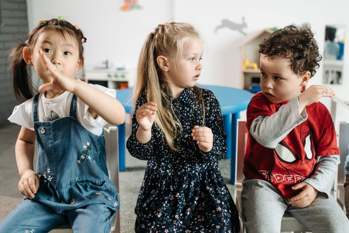 Children playing and learning in a bright classroom