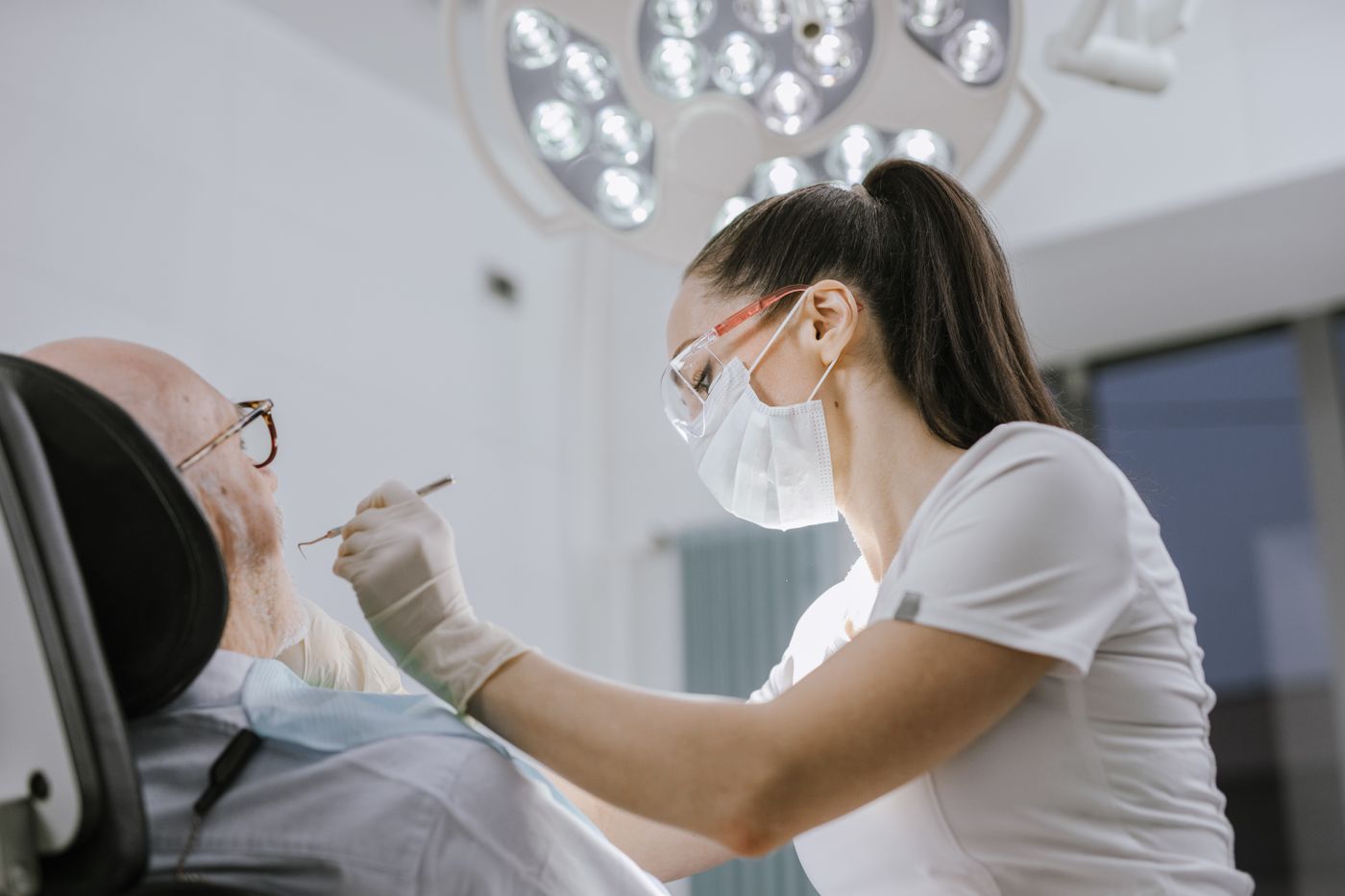Dentist providing gentle care to a patient