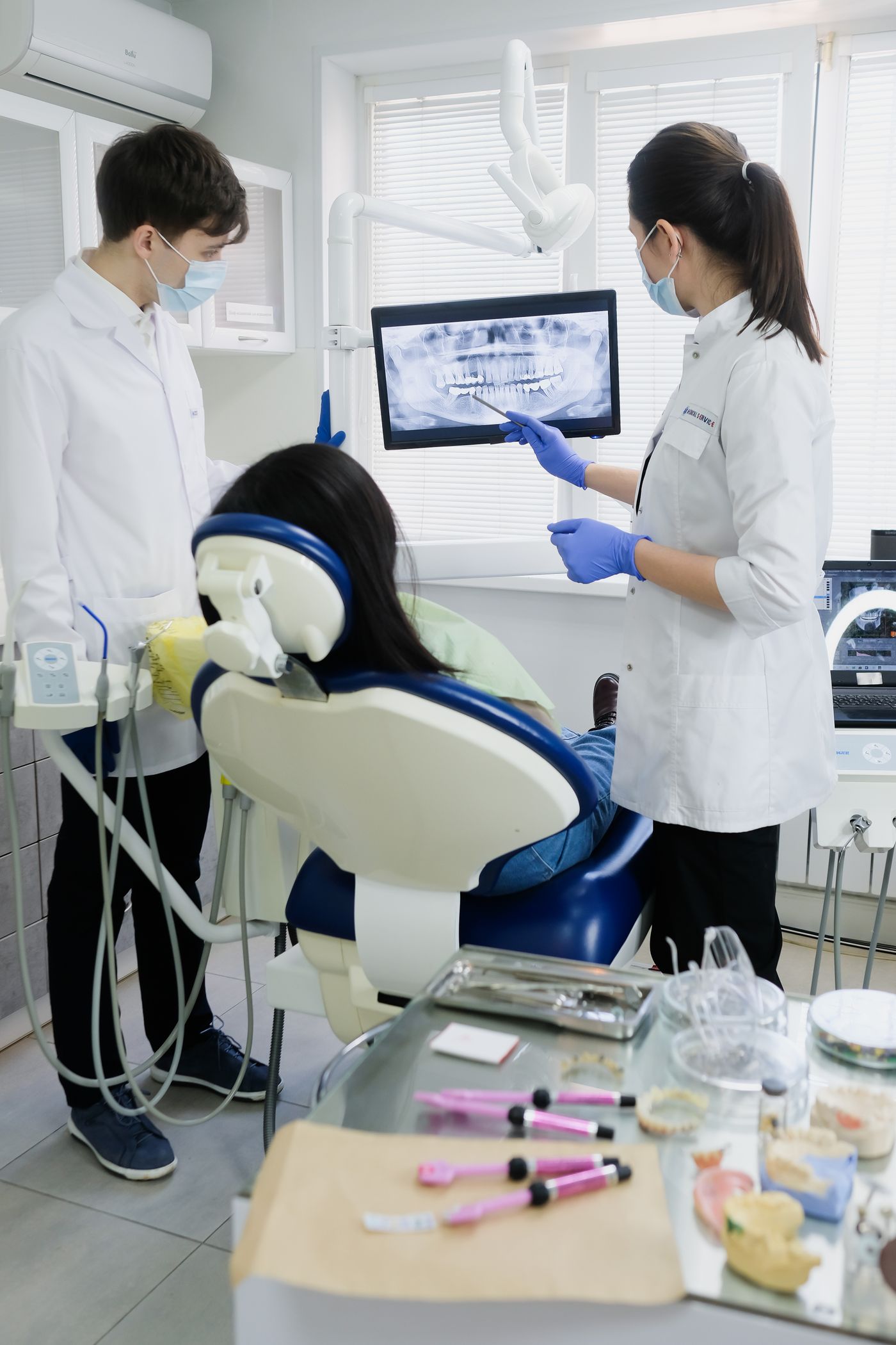 Dentists reviewing a digital x-ray