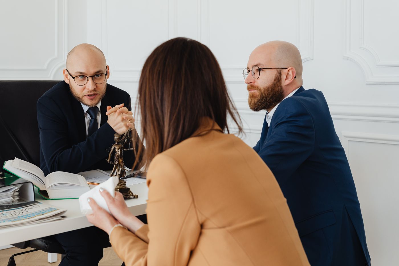 Partners in discussion in the conference room