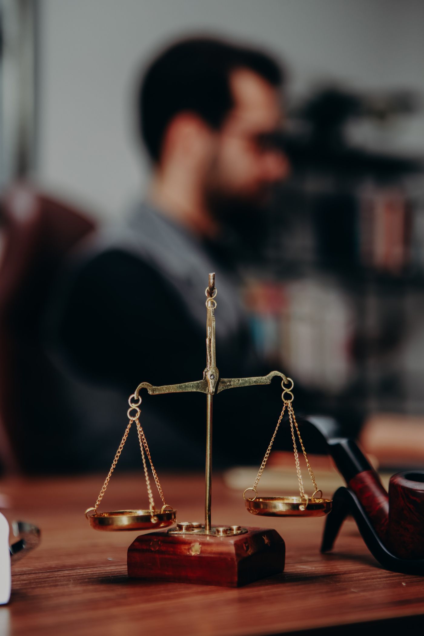 Scales of justice on a partner's desk