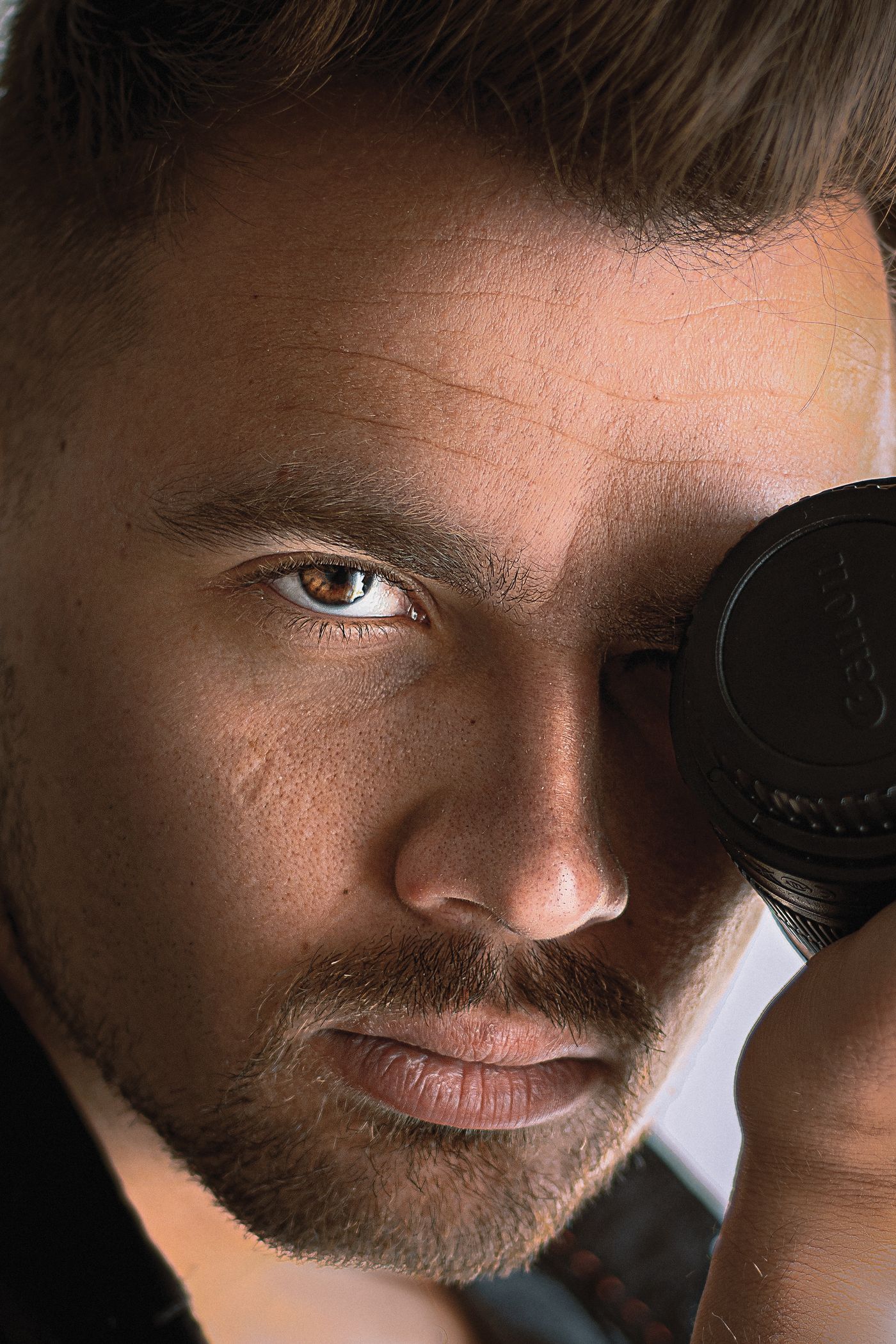 Close portrait through the lens