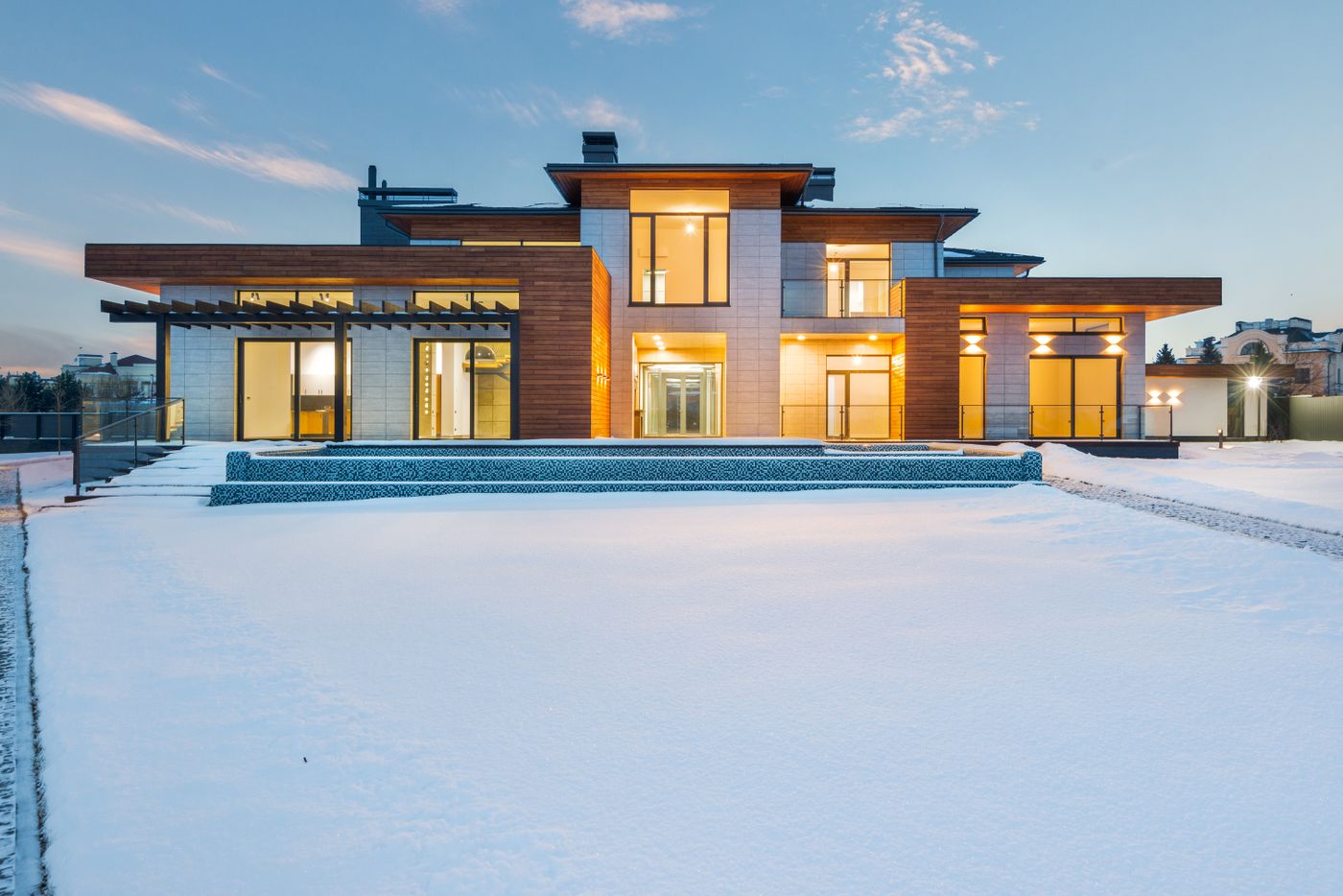 Illuminated villa at dusk