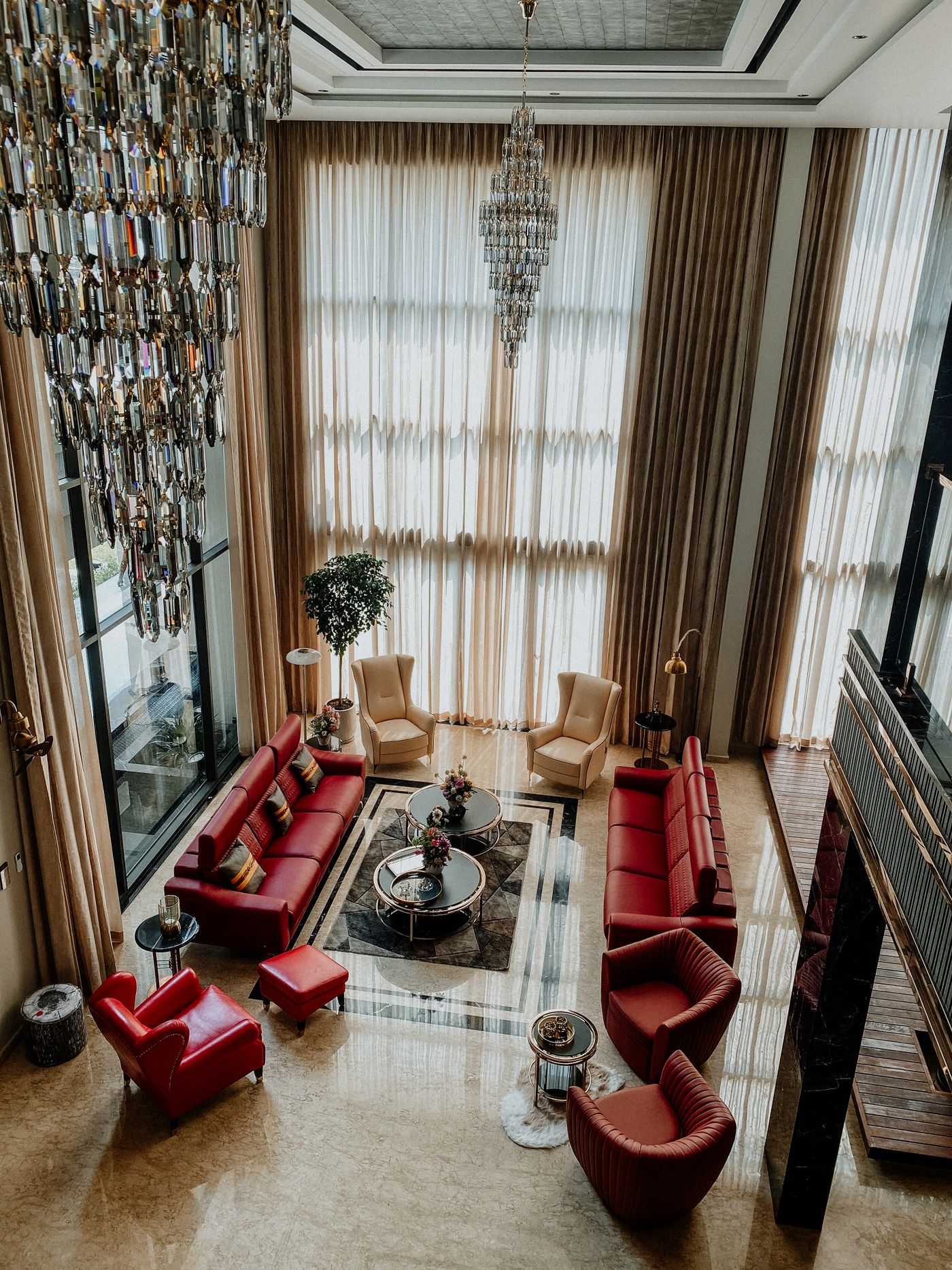 Lavish staged living area with chandelier